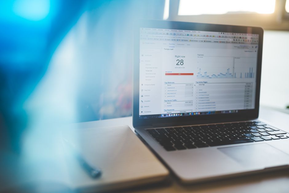 A laptop screen showing a real-time analytics dashboard