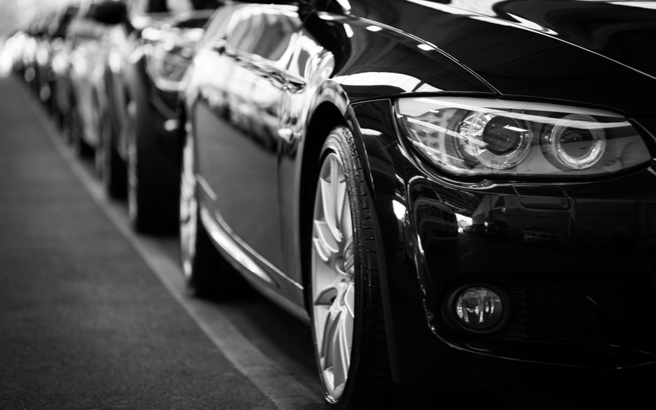 A lineup of luxury vehicles, the kind of client this transport company serves